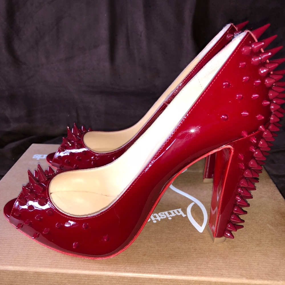 Christian Louboutin burgundy spiked toe outs